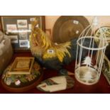A large resin cockerel figure, a candle cage lamp, and wooden wall hanging duck and a small tapestry