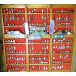 Six pine wall racks containing a collection of plated and other souvenir teaspoons - sold with other