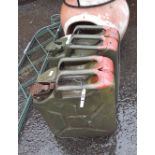 Two large green painted metal jerry cans - late 20th Century