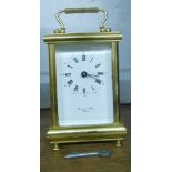 A 20th Century brass and bevelled glass cased carriage timepiece with dial marked for Bornand