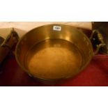 A Victorian brass pan