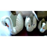 A graduated set of three Dartmouth Pottery swans