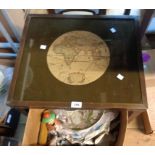 A 54cm hardwood and brass bound coffee table with reproduction map print under glass to top