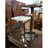 An Art Nouveau stained wood framed corner chair with inlaid roundel to top rail and remains of