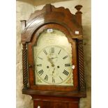 A 19th Century flame mahogany longcase clock, the 30cm painted arch dial marked for Coleman,