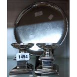 A pair of 9cm plated metal squat pedestal stands - sold with a Keswick SIA Perth Staybrite beaten