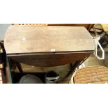 An 89cm 20th Century oak drop-leaf table, set on square tapered legs