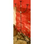 A wrought iron three branch candelabrum - sold with a pair of similar wall sconces