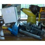 A steel tool tray, oil jug, tools, etc.