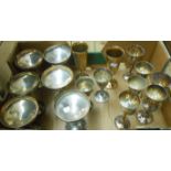 A collection of silver plated goblets and champagne coupes including two sets of six