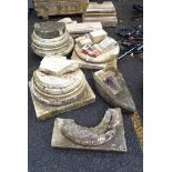 A selection of stone pillar bases and mouldings, etc.