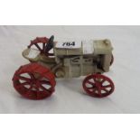 A metal model of a Fordson tractor