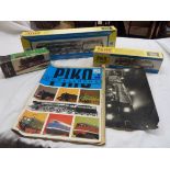 Three boxed Piko HO gauge model locomotives, related paperwork and photo