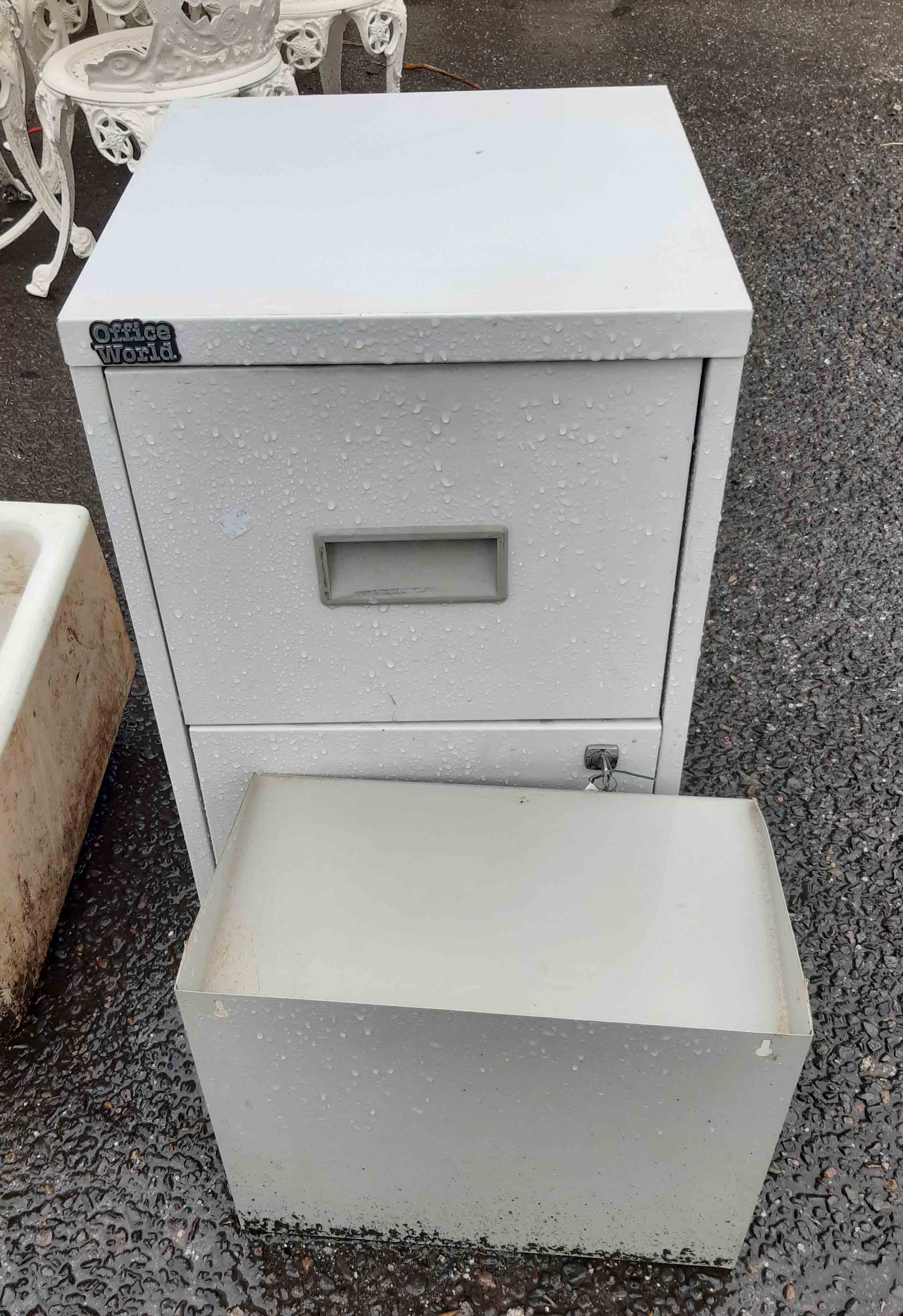 An Officeworld grey painted two drawer filing cabinet with key - sold with a metal file tray