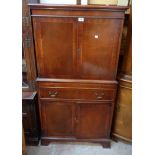 A 75cm reproduction mahogany and crossbanded drinks cabinet with two doors to top, slide, long