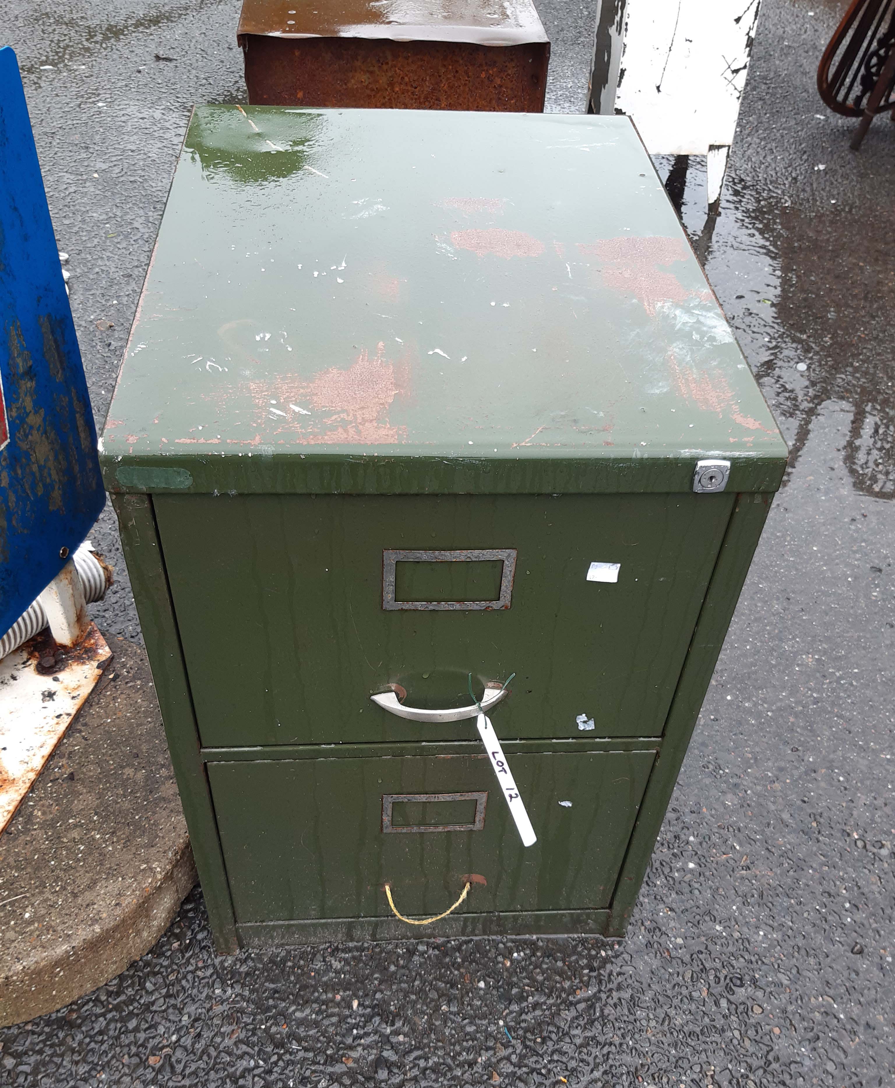 A vintage green metal painted two drawer filing cabinet