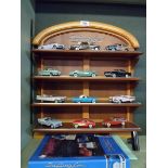 A set of twelve Franklin Mint Classic Cars of the Fifties with booklets and stand