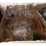 A box of assorted drinking glasses including Stuart, etc.