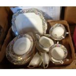 A box containing an Aynsley bone china part tea set