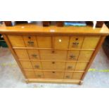 A 1.08m late Victorian golden oak Gothic revival style chest of two short and three long graduated