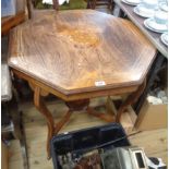 A 75cm Edwardian inlaid rosewood octagonal topped centre table, set on cabriole supports with