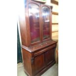 A 1.12m Victorian mahogany book cabinet with glazed top section (no cornice) over a base with