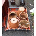 Three terracotta wall hanging pots, three others and a bonsai dish