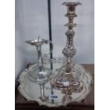 A 34cm high ornate silver plated copper candlestick - sold with silver plated tray and oil wick