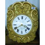A 19th Century French comtoise wall clock with ornate embossed brass dial border and pendulum