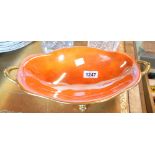 A Carltonware lozenge shaped bowl with orange and blue lustre glaze