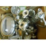 A quantity of silver plated items, including candlesticks, goblets, condiments, entree dish, wine