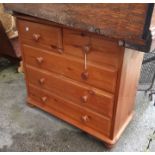 A modern pine chest of two short and three long drawers - wear