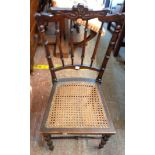 A late 19th Century simulated bamboo framed standard chair with Art Nouveau style incised decoration