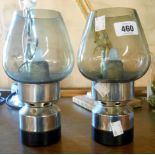A pair of mid Century Mason Constant Flame candle lamps and smoked glass shades
