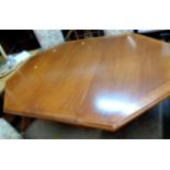 A 1.66m modern Delorme polished mixed wood extending dining table with canted corners and single