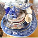 A large blue and white meat plate, Wedgewood Willow tureen, Swansea jug, etc.