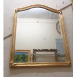 A reproduction gilt framed dome-top wall mirror with decorative corners and bevelled plate - 70cm