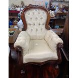 A reproduction Victorian style miniature part show frame spoon back drawing room armchair with