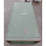 A 91cm vintage green painted metal cabinet with shelves enclosed by a pair of doors - 1.83m high
