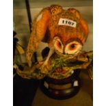 A Royal Doulton barn owl figurine D.A. 1, handpainted in the matt finish with original wooden stand