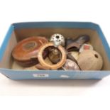 A box containing assorted collectable items including leather clad Chesterman tape measure,