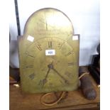 An antique alarm wall clock movement of maritime interest, the 25.5cm arched brass dial with