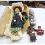 Four costume dolls including two American Indian examples