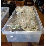 A crate containing a quantity of Edwardian pall mall pattern drinking glasses including sherries,