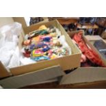 Two boxes containing assorted costume dolls