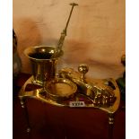A small selection of brassware including antique mortar, trivet, etc.