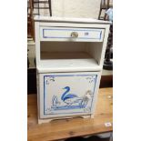 A 37cm painted mixed wood bedside cabinet with heron decoration, drawer, recess and door under
