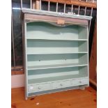 A 72cm painted wood wall mounted unit with decorative top, three shelves and three short drawers