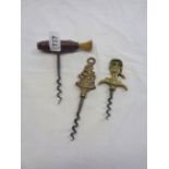 A Victorian corkscrew with turned wood handle and brush - sold with two vintage brass handled