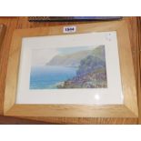 H.W. Hicks: a framed gouache, depicting a Westcountry coastal view - signed - 11.5cm X 21.5cm